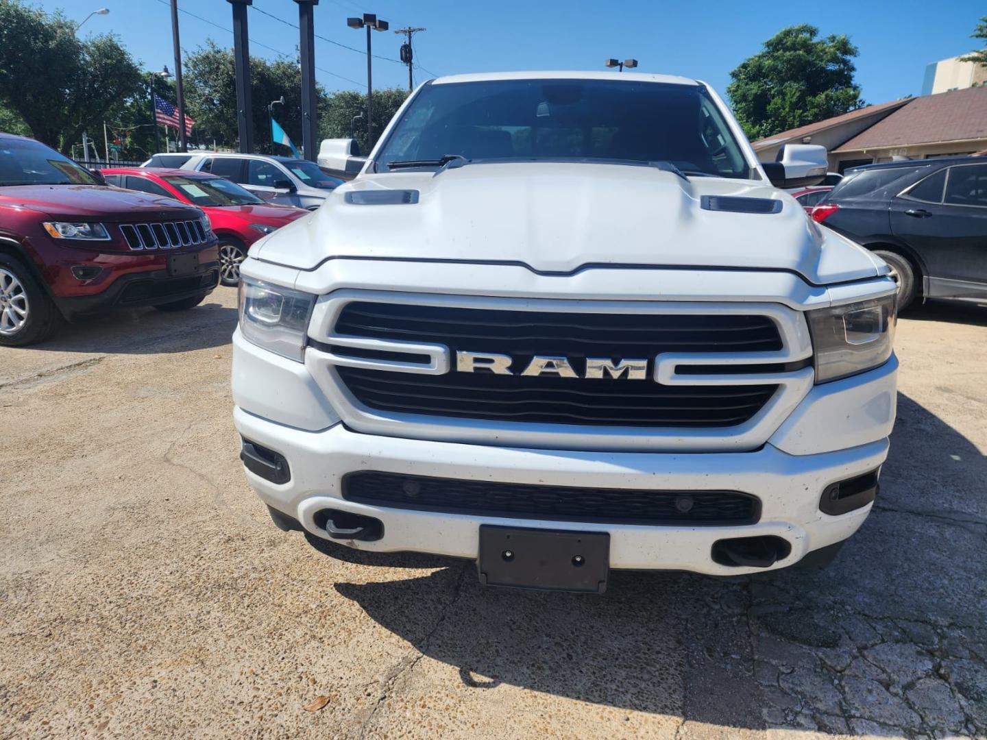 2019 white RAM 1500 Laramie Crew Cab LWB 4WD (1C6SRFRT3KN) with an 5.7L V8 OHV 16V engine, 8A transmission, located at 945 E. Jefferson Blvd, Dallas, TX, 75203, (214) 943-7777, 32.752514, -96.811630 - Photo#1